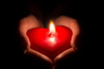 Giving-back-red-heart-candle