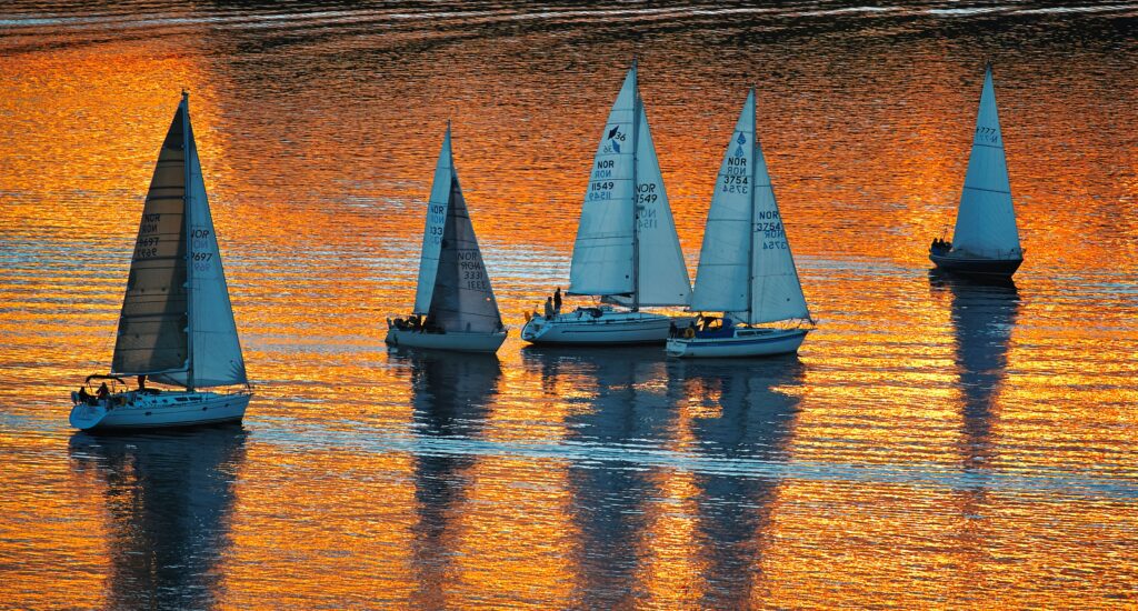 Sailboats at sunset, metaphor to unlock career narratives
